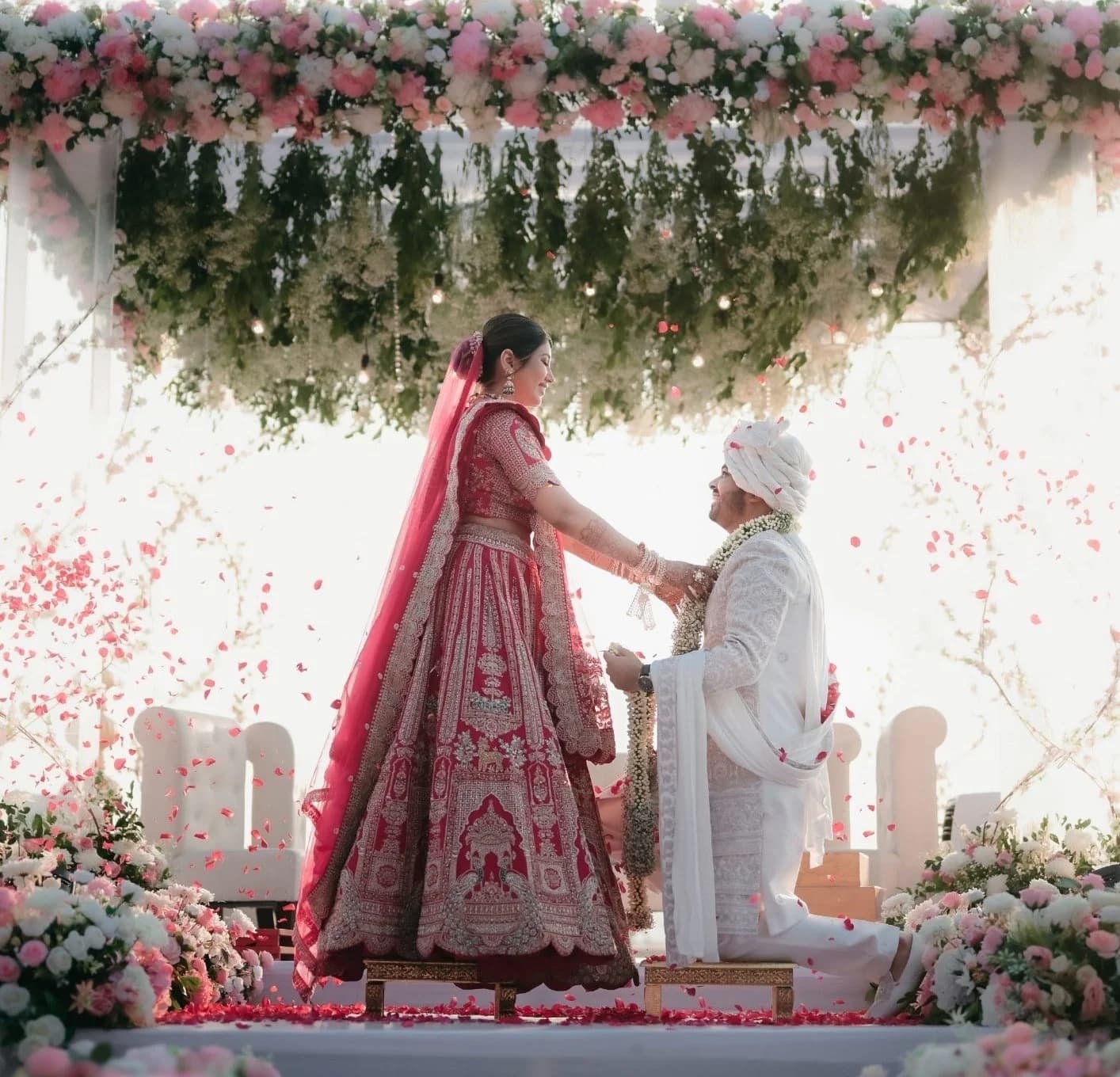 Real Eternal Weddingz couple under a floral mandap